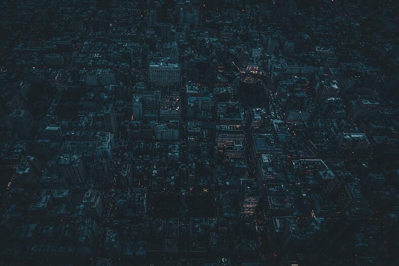 cached/dharmx_walls/aerial/aerial_view_of_a_city_at_night.jpg