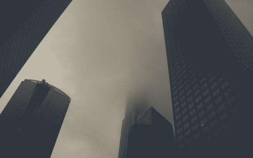 cached/dharmx_walls/apeiros/a_group_of_tall_buildings_with_clouds_in_the_sky.png