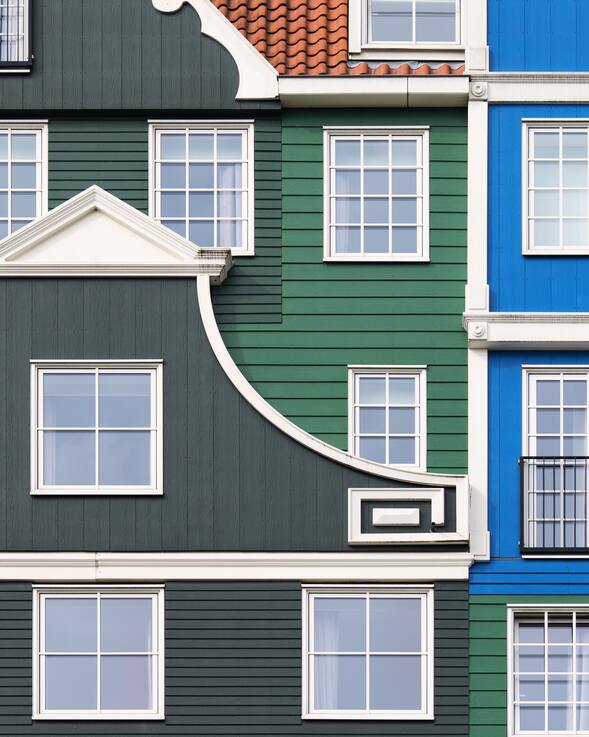 cached/dharmx_walls/architecture/a_multi-colored_building_with_many_windows.jpg