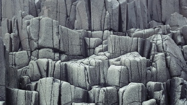 cached/dharmx_walls/basalt/a_close-up_of_a_rocky_area.jpg