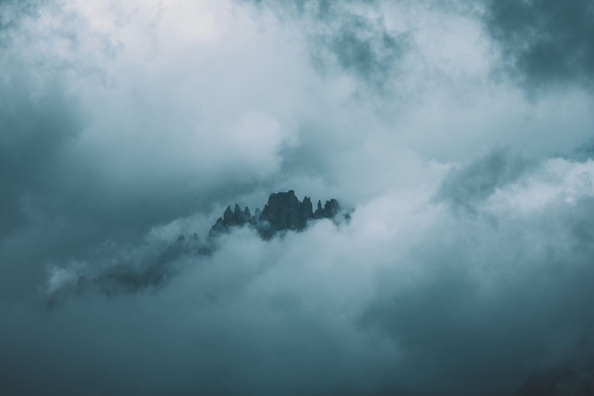 cached/dharmx_walls/cold/a_mountain_with_clouds_in_the_sky.jpg