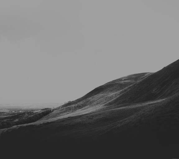 cached/dharmx_walls/monochrome/a_black_and_white_image_of_a_hill.jpg