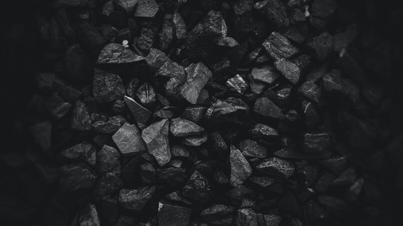 cached/dharmx_walls/monochrome/a_pile_of_black_rocks.jpg