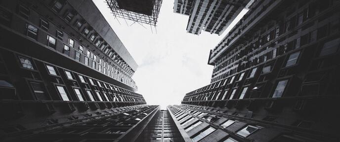 cached/dharmx_walls/monochrome/looking_up_view_of_tall_buildings.jpg