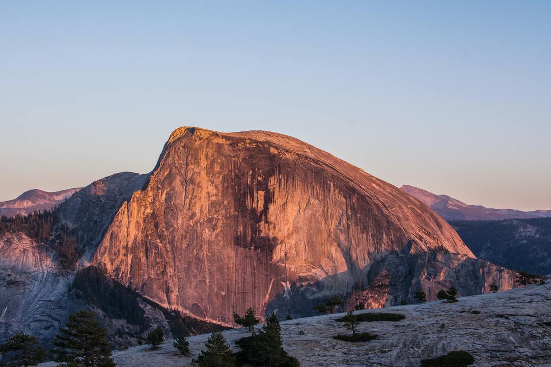 cached/dharmx_walls/mountain/a_large_rock_formation_in_the_mountains.jpg