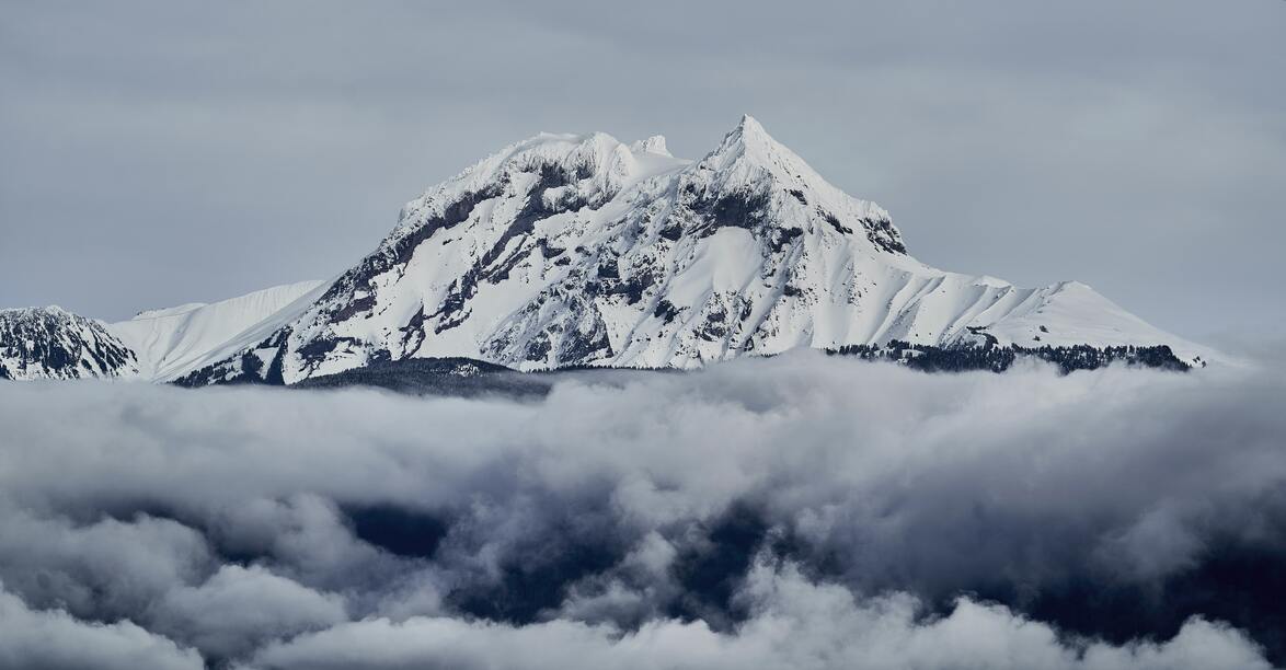 cached/dharmx_walls/mountain/a_mountain_with_snow_and_clouds.jpg