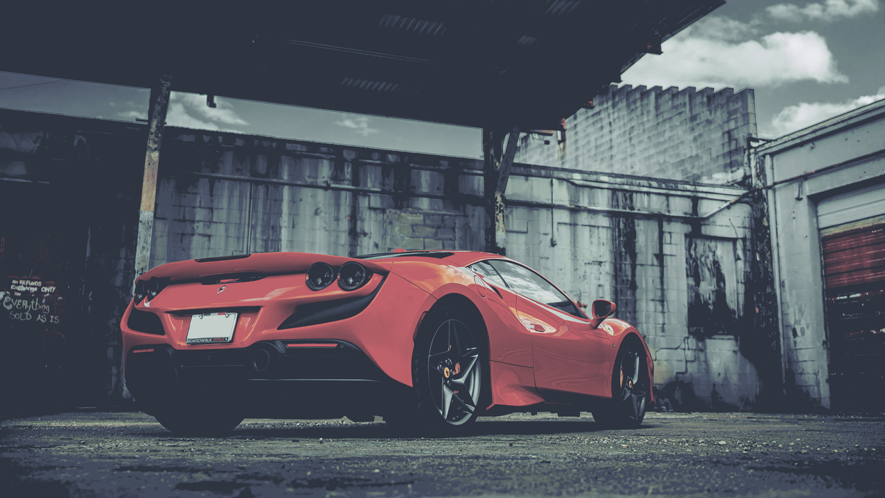 cached/dharmx_walls/nord/a_red_sports_car_parked_in_a_garage.png