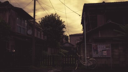 cached/dharmx_walls/unsorted/a_bicycle_parked_on_a_street.jpg