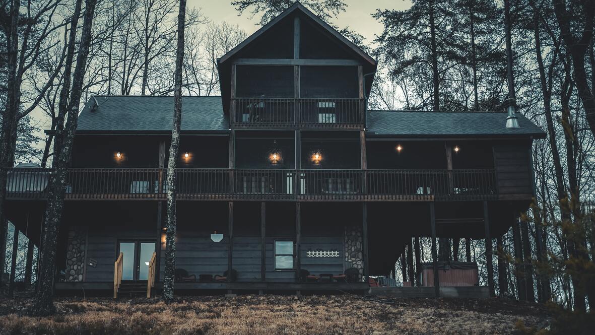cached/dharmx_walls/unsorted/a_house_with_a_porch_and_a_porch.jpg