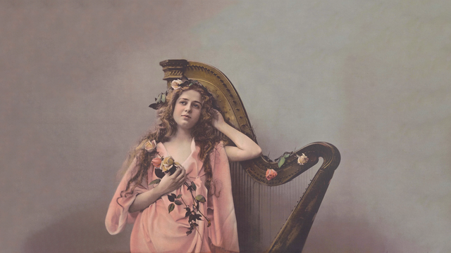 cached/dharmx_walls/unsorted/a_woman_in_a_pink_dress_with_flowers_on_her_head.png